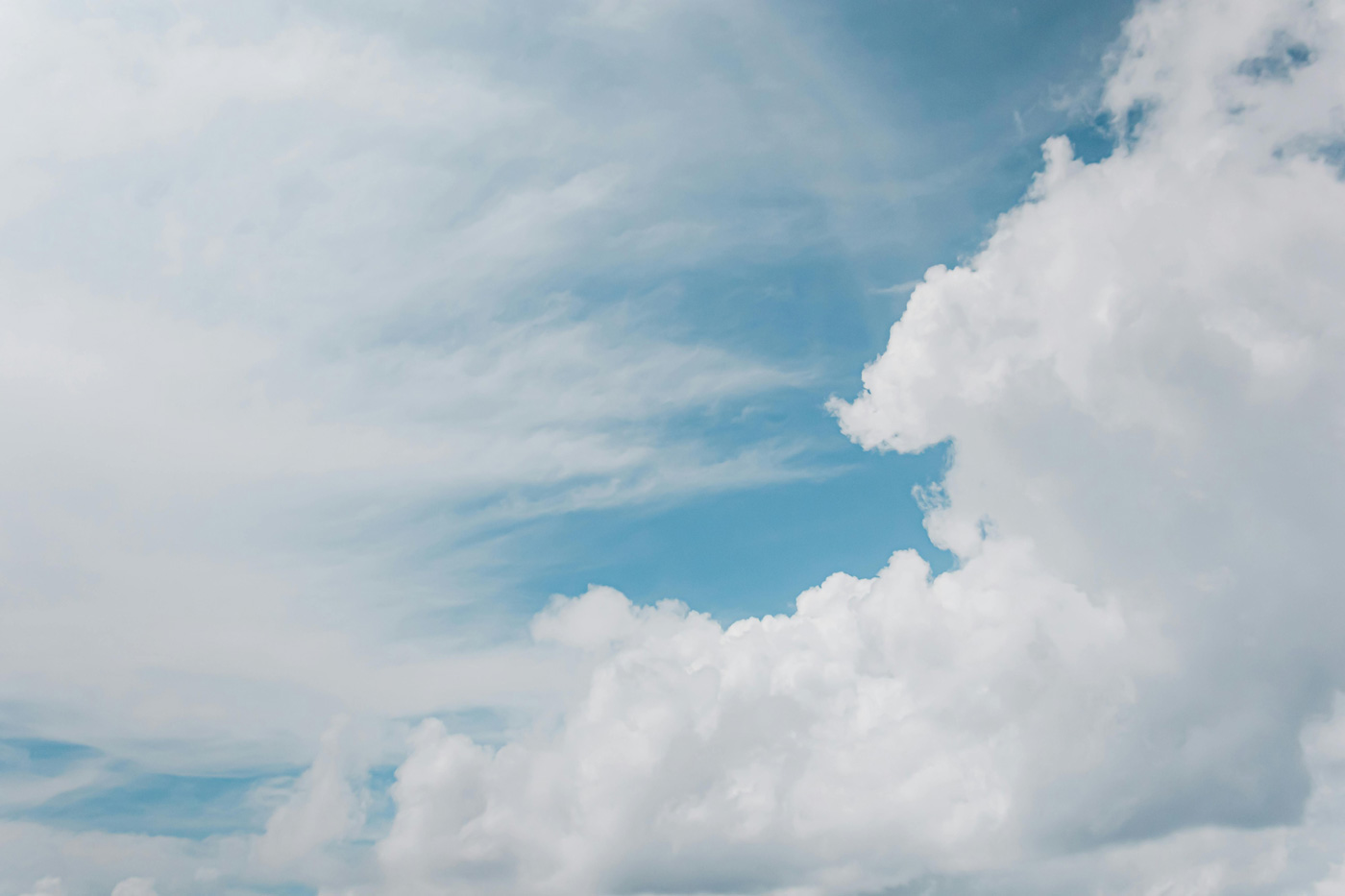 Blue sky with large white clouds